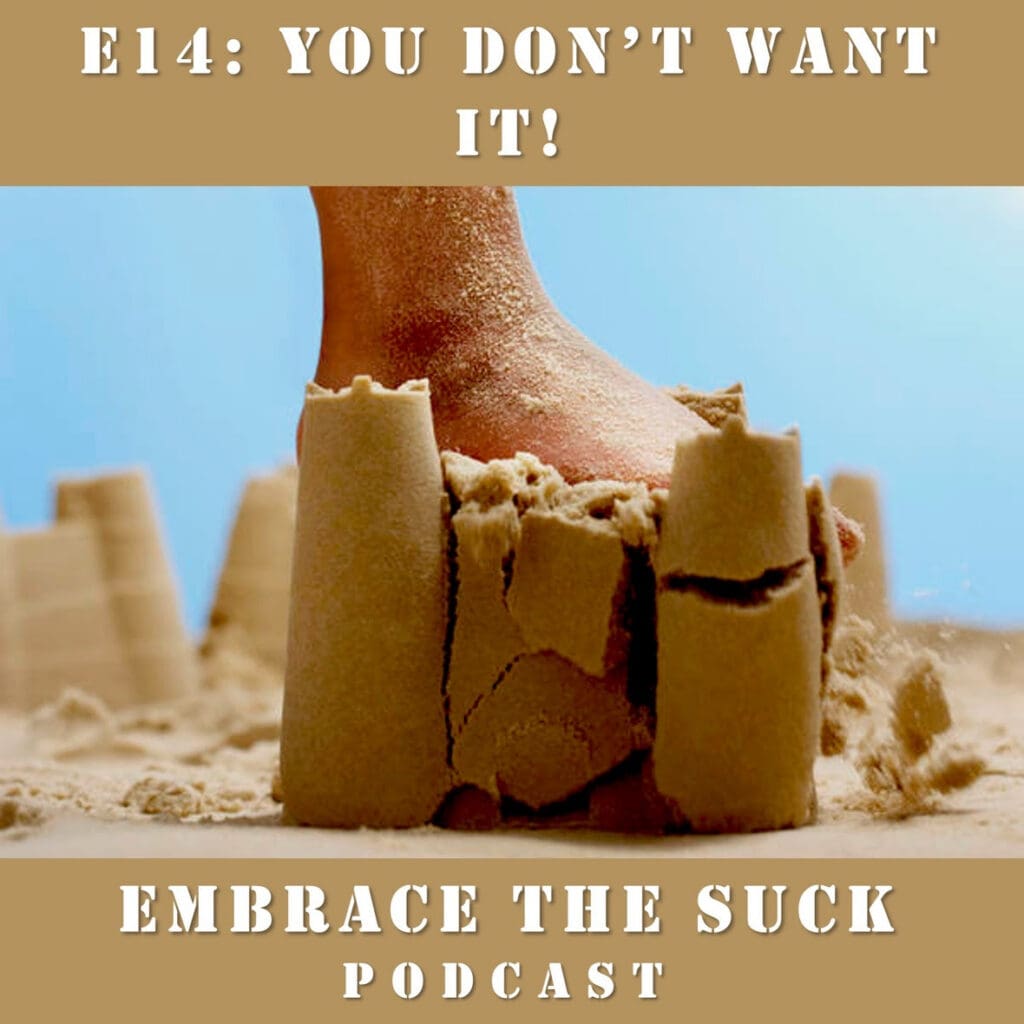 Bare foot squashing sandcastle tower